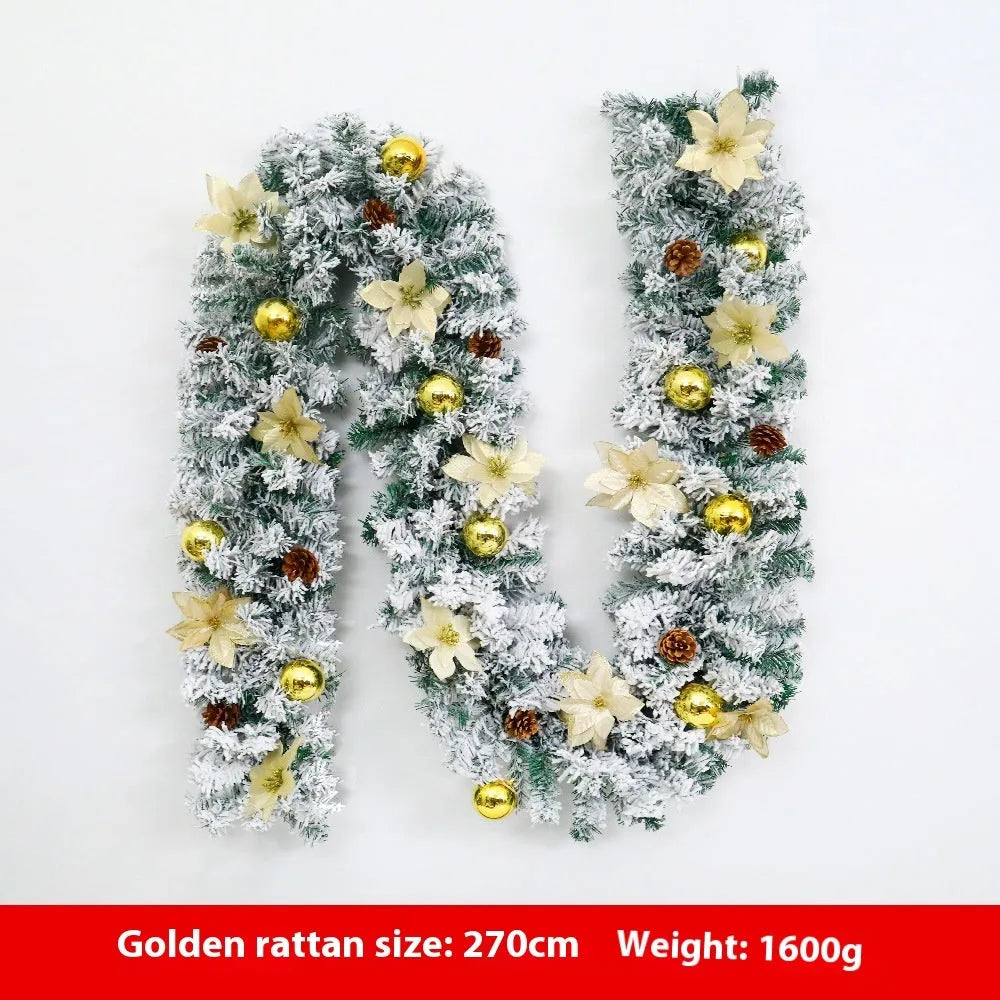 PVC Christmas rattan garland with flocked finish in golden colour option draped over mantelpiece