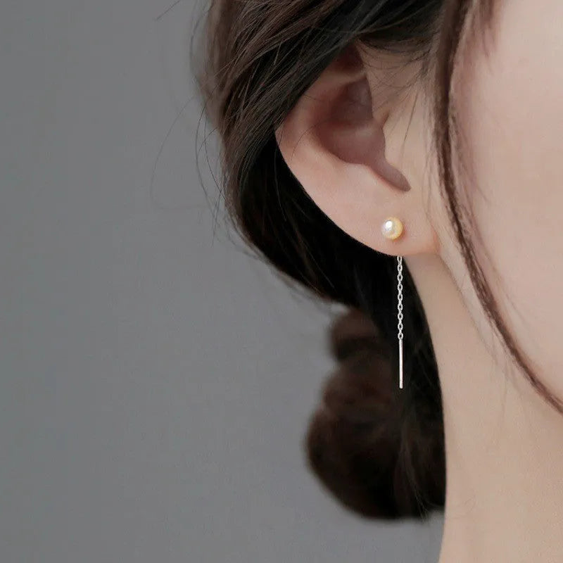 Sterling silver ear thread earrings with a selection of pearl, zircon, clay ball, and geometric star or heart charms.