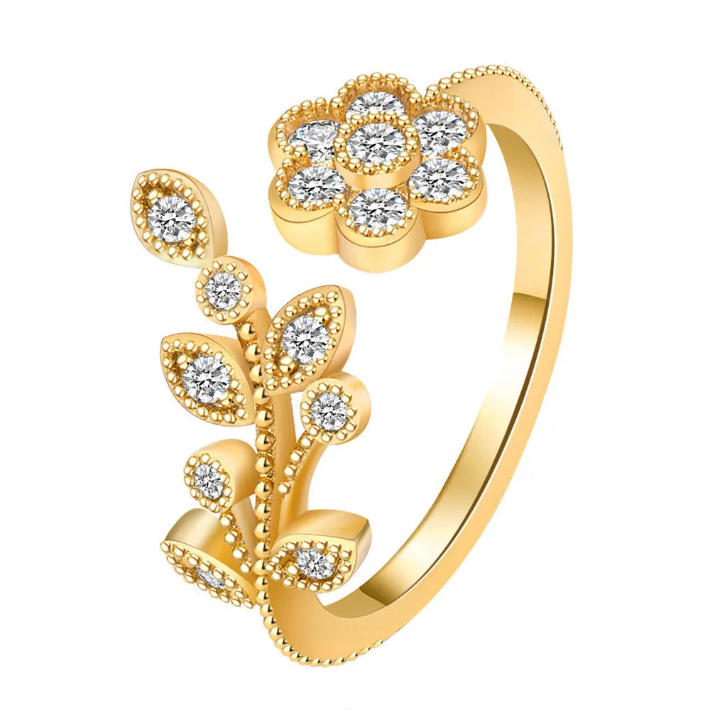 Copper open ring with diamond-treated floral leaf design in gold or white colour.