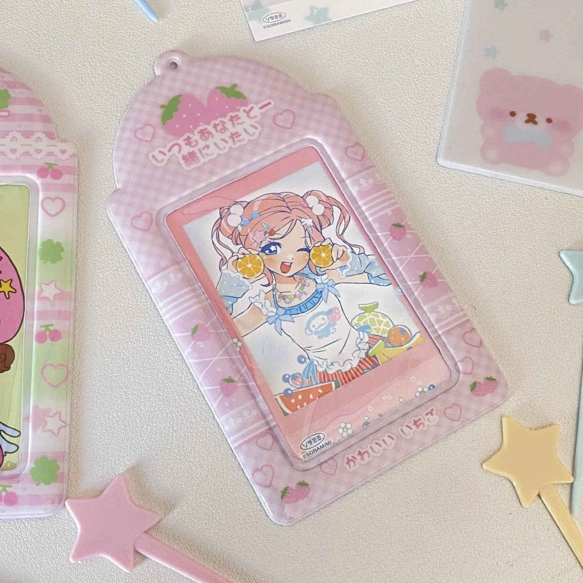 Cartoon strawberry design clear PVC card holder for 3-inch ID badges and passes.