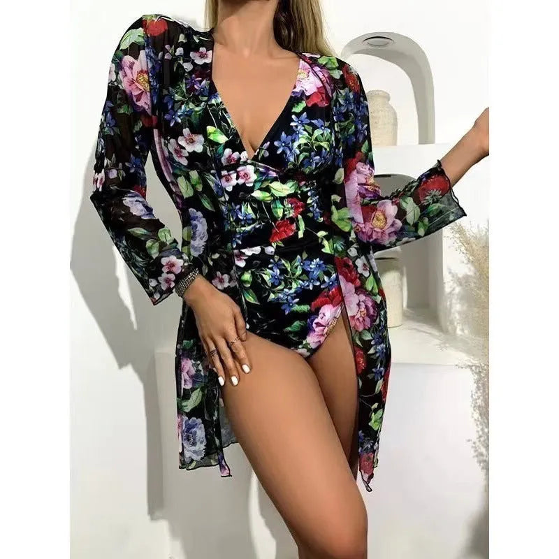 Women's floral pattern bikini three-piece swimsuit set with matching cover-up coat in polyester fabric