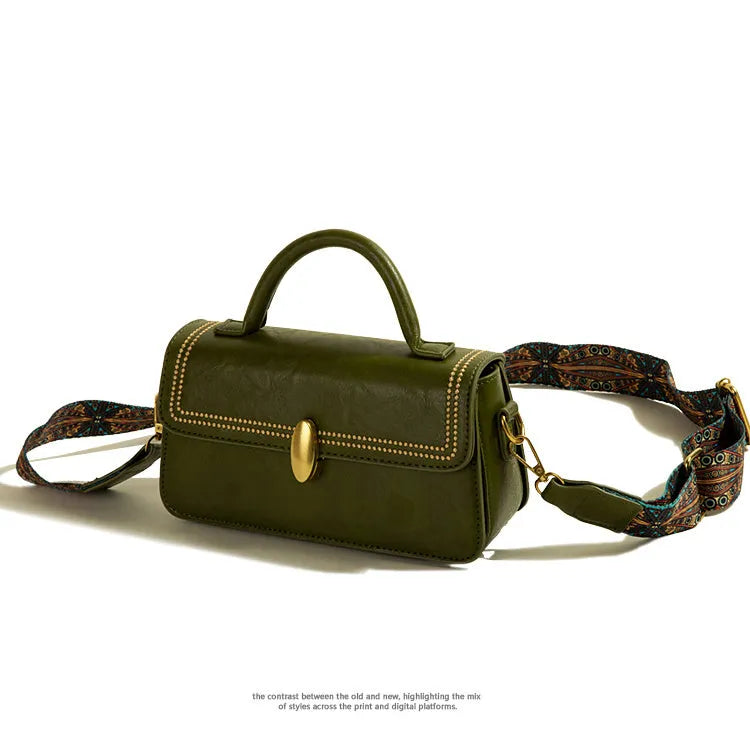 Brown retro messenger bag with square vertical shape showing sandwich pocket design and shoulder strap