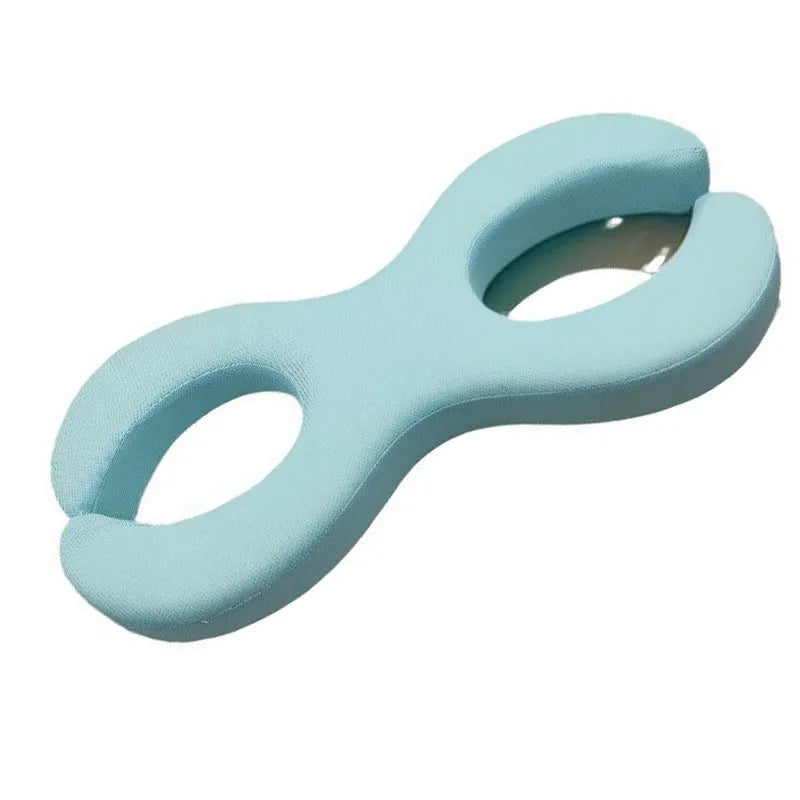 Blue cylindrical memory foam cervical traction pillow showing 6cm and 9cm thickness options