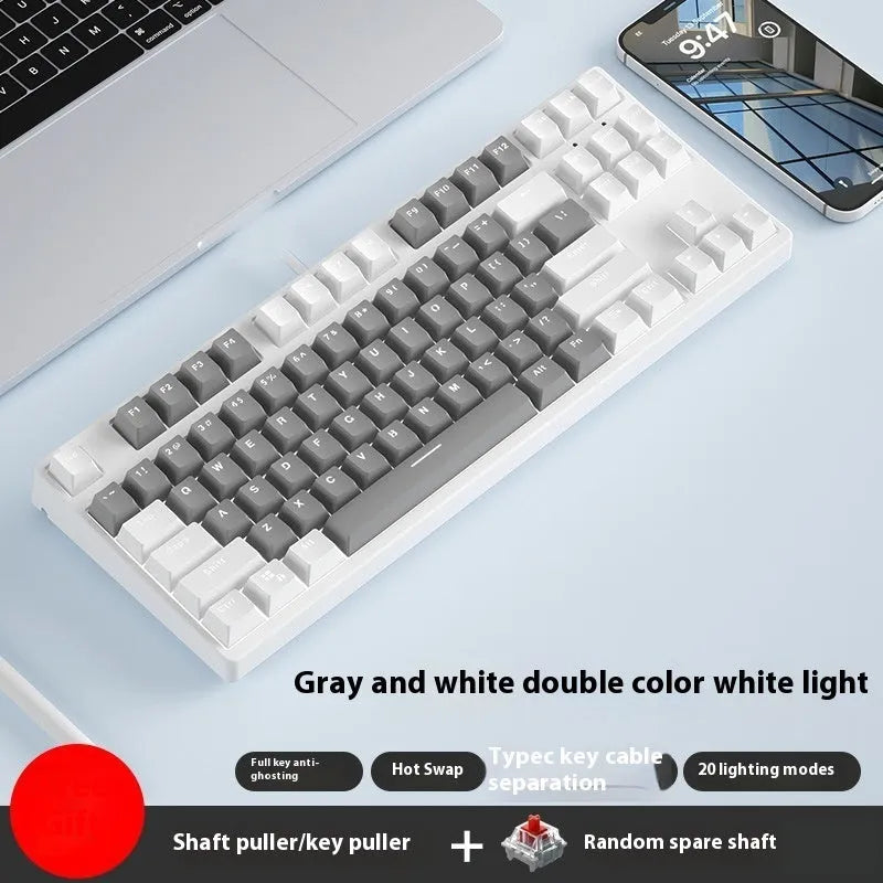 87-key wired mechanical gaming keyboard with multi-colour keycaps on a metal body.