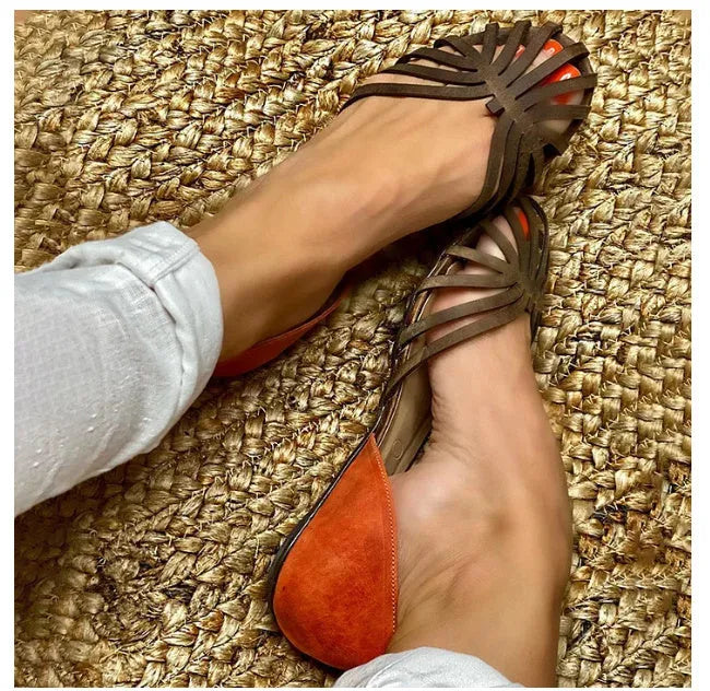 Women's leopard print flat sandals with a square buckle and ankle strap in dark brown.