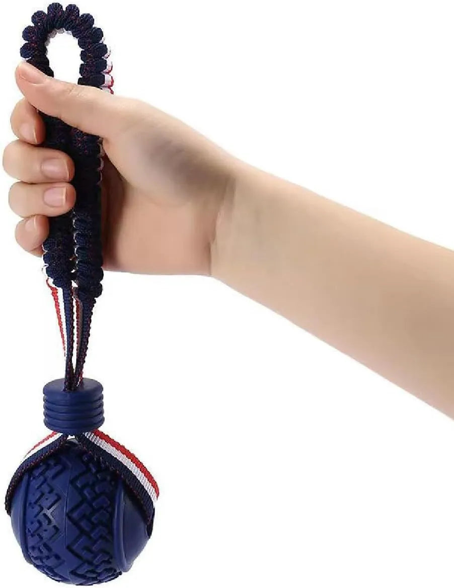 Blue rubber dog ball with attached rope toy measuring 6.5cm diameter