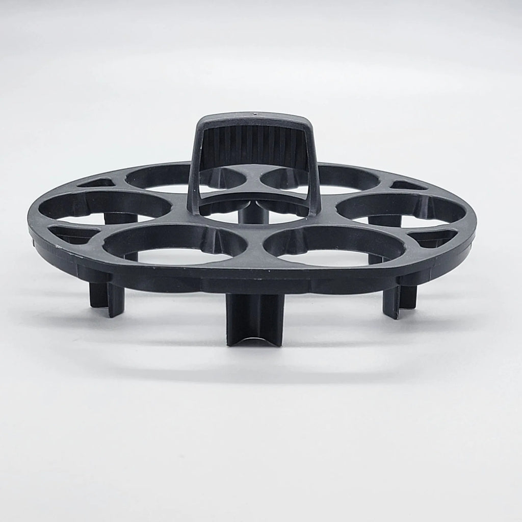 Black plastic egg holder with retainer design for kitchen storage, measuring 13.8cm by 12.6cm
