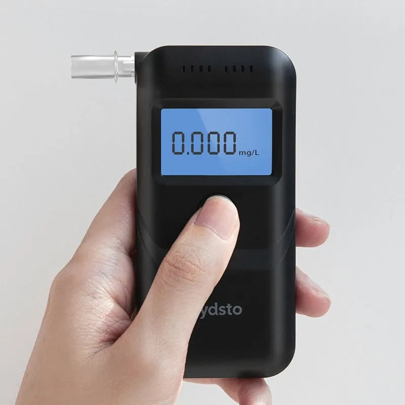 Black household alcohol breath tester device for drinking checks and drunk driving prevention