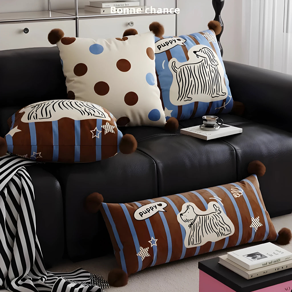 Blue cartoon animal decorative cushion pillow on a grey sofa with a removable cover.
