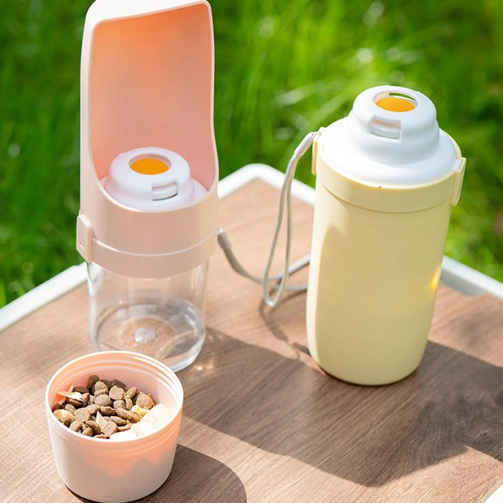 Grey 2-in-1 portable dog water bottle and food feeder with lanyard attached