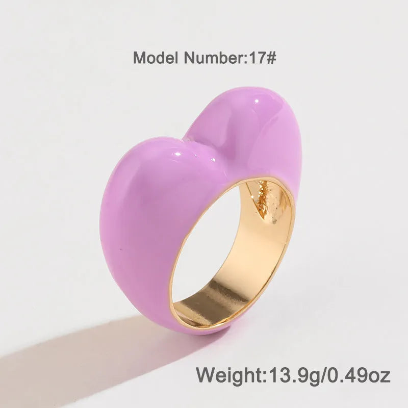 Three-dimensional heart-shaped enamel ring in a choice of colours on a zinc alloy band.