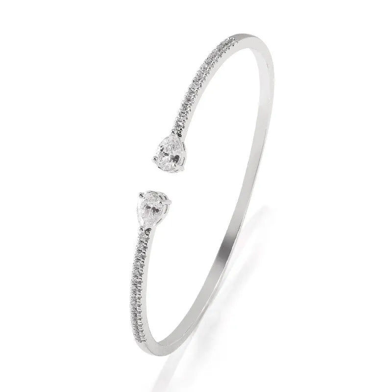 Copper bracelet with multi-zircon inlay stones in simple style, shown in white and blue colour options