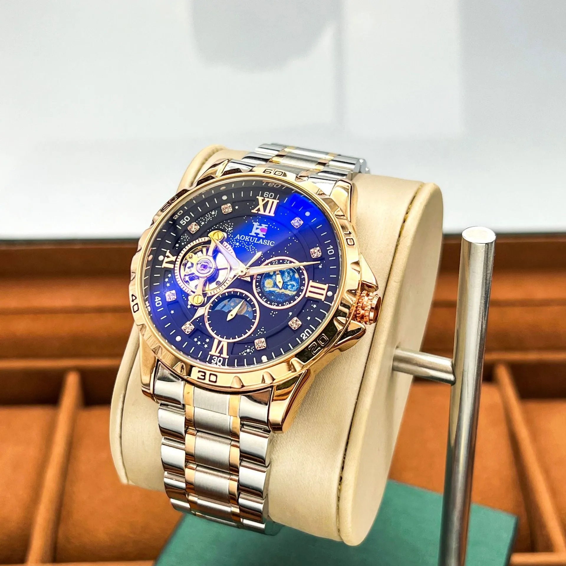 Men's automatic mechanical watch with rose gold case and large black dial