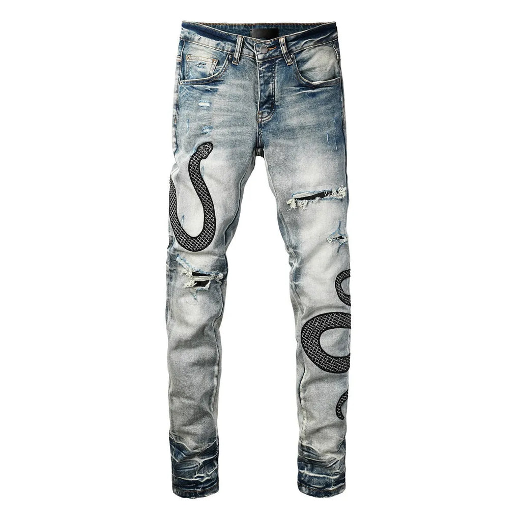 Blue distressed skinny jeans with button fly closure and micro elastic cotton fabric