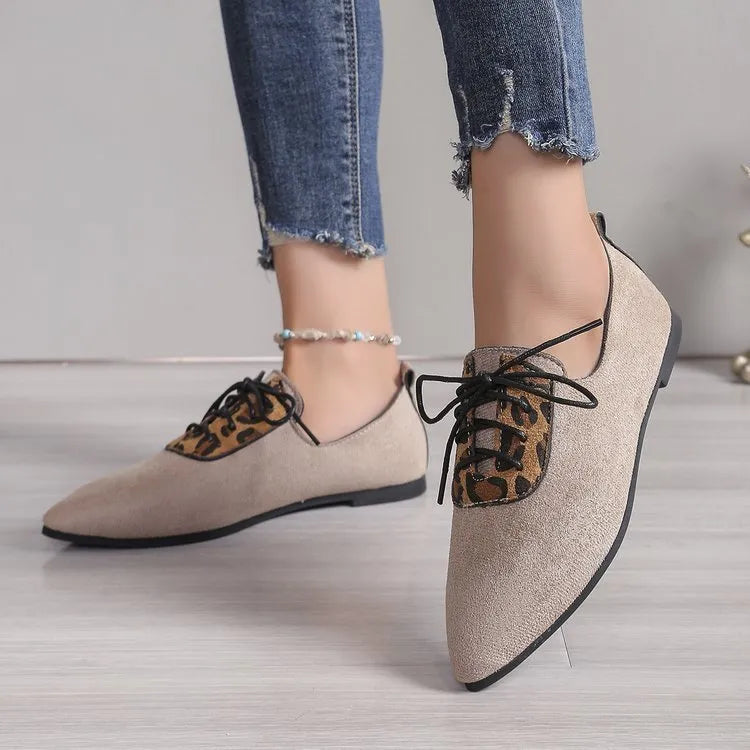 Beige leopard print plus-size women's pumps with pointed toe design on rubber sole