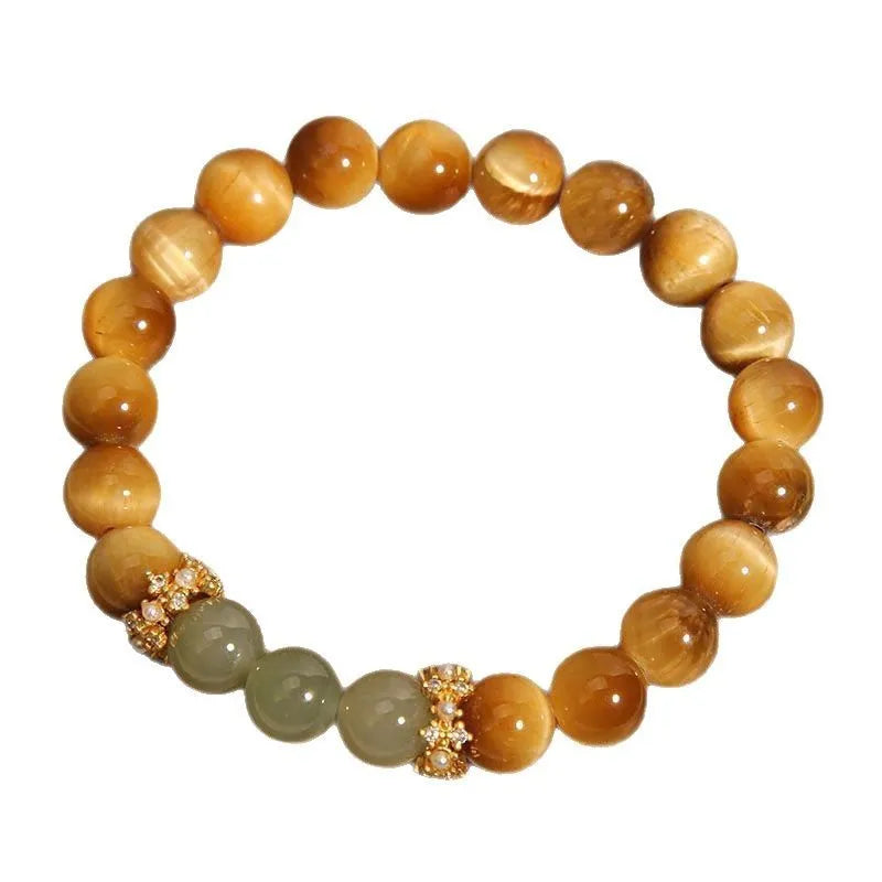 Natural Yellow Tiger's Eye and Hetian Jade beaded bracelet with gold gourd or bamboo joint design.