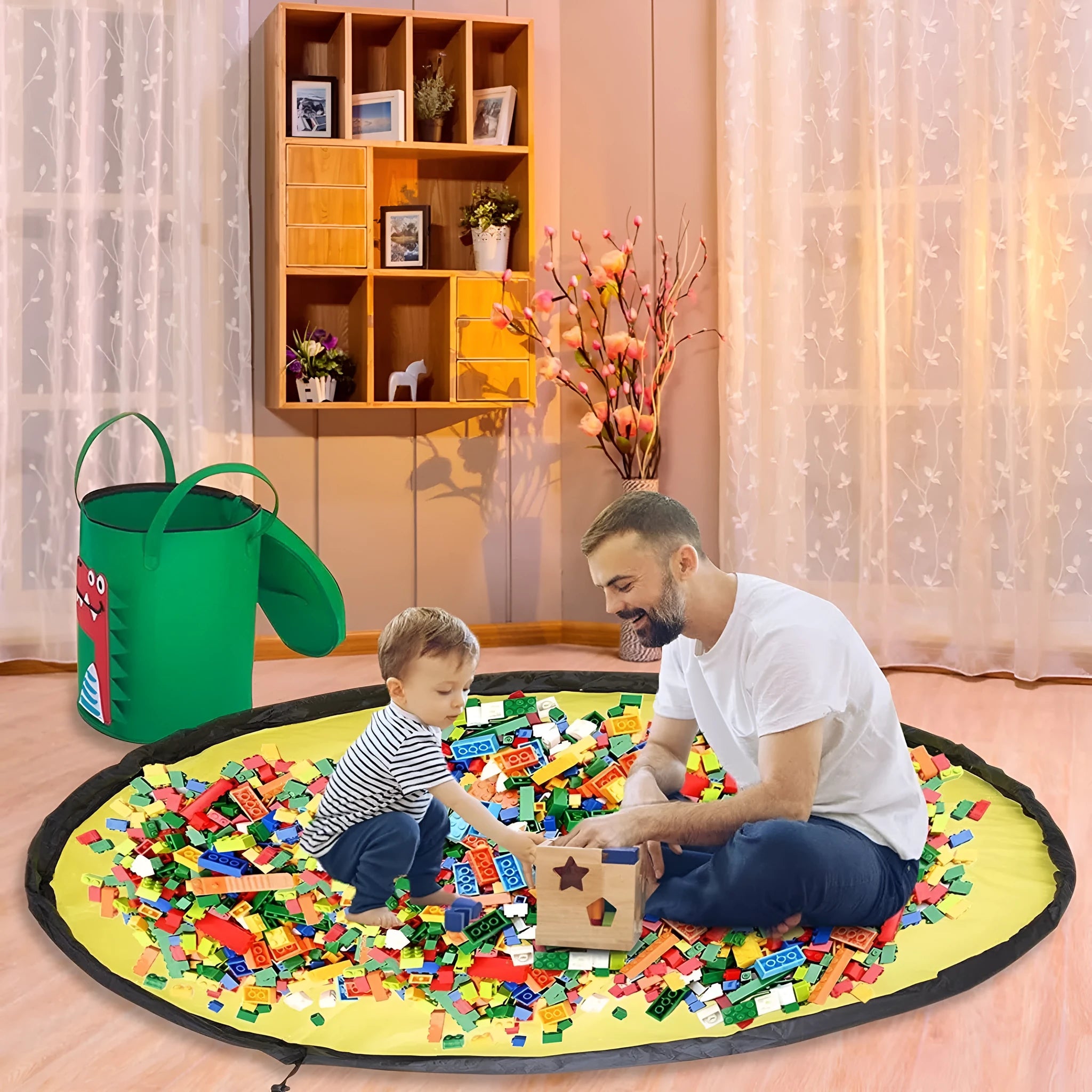 Green felt cube storage bag with pull rope laid flat as play mat for toy organisation
