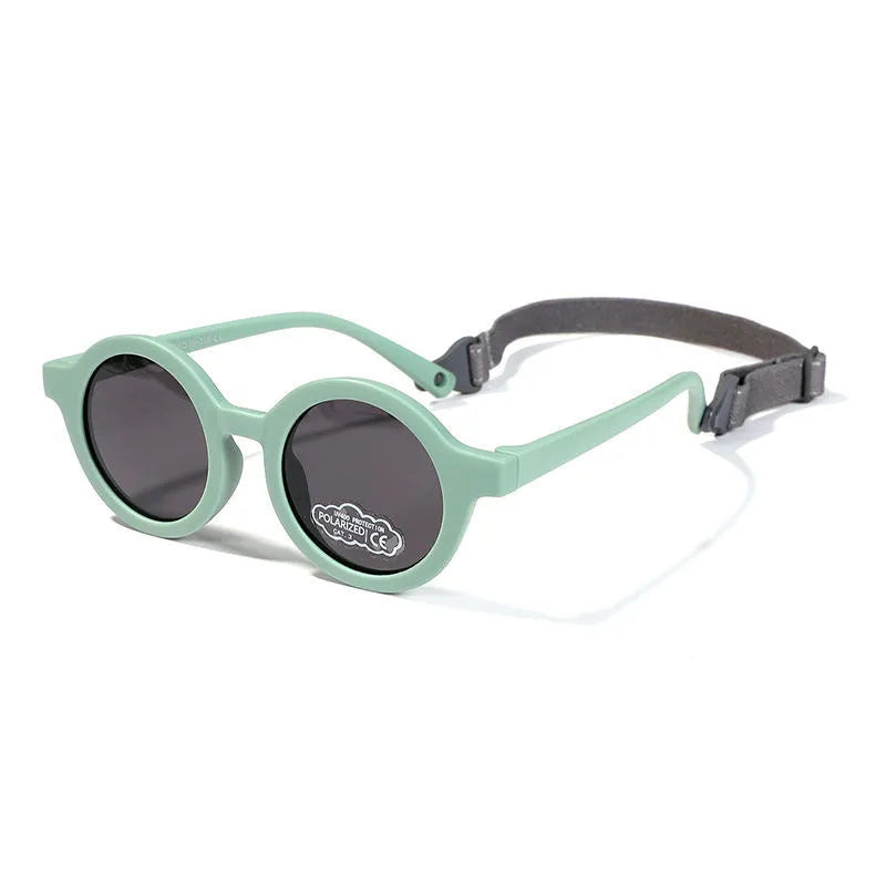 Soft silicone round-frame sunglasses for babies and toddlers aged 0-3 years with polarised UV400 lenses.