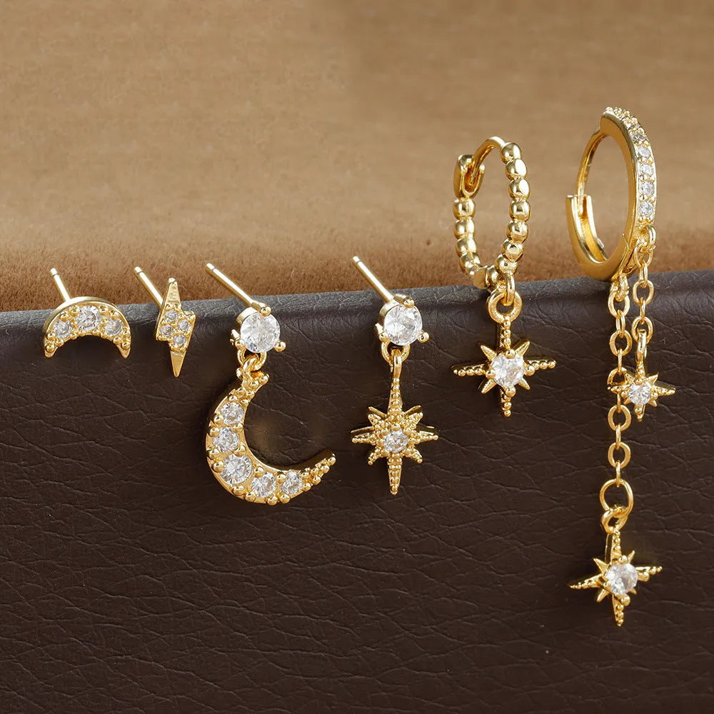 Set of six gold-coloured chain tassel earrings with zircon studs for women.