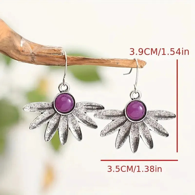 Purple Bohemian style flower earrings with animal zodiac design and resin gemstone detailing