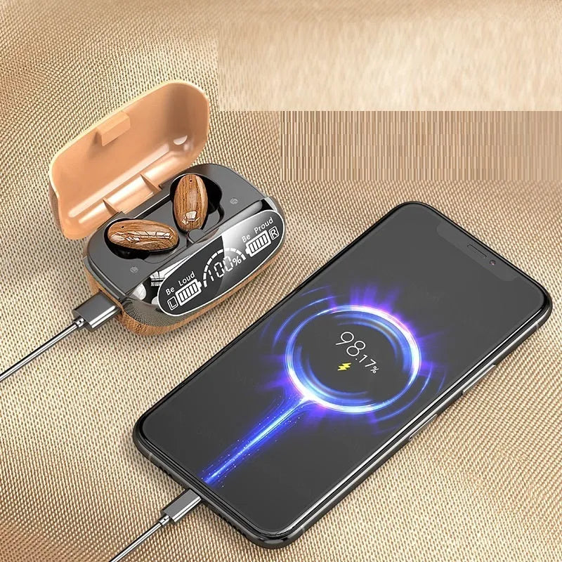 M35 wood grain finish True Wireless Stereo Bluetooth earphones and charging case on a table.