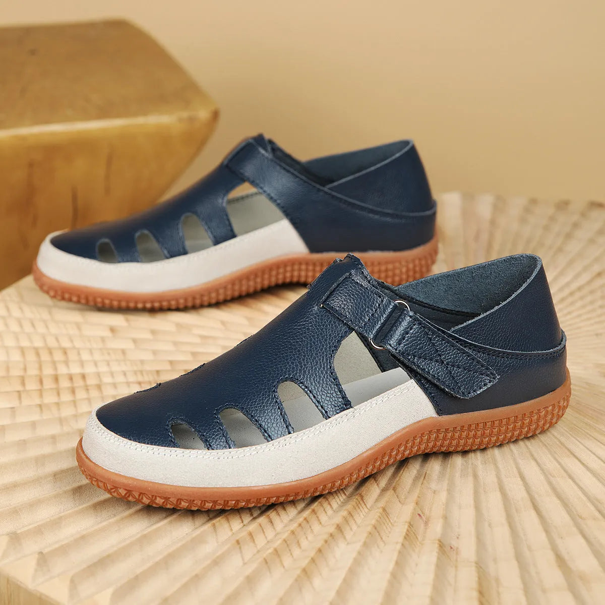 Women's plus size flat sandals with toe cap and hollow breathable design in blue colour