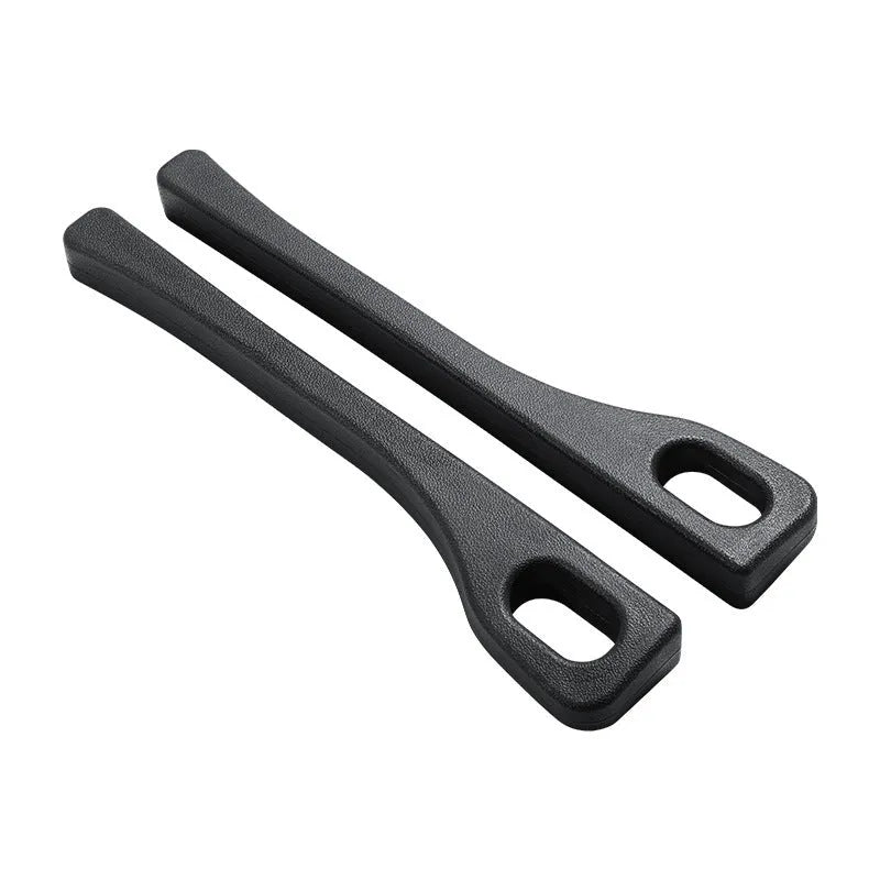 Black polyurethane car seat gap filler strip preventing items falling between vehicle seats