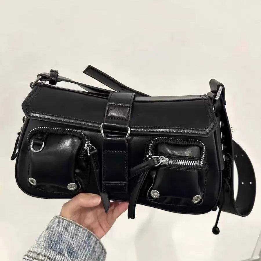 Black structured PU baguette messenger bag with a long adjustable shoulder strap.