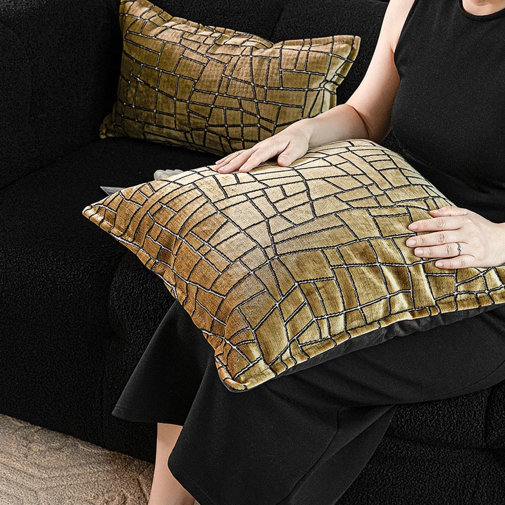 Geometric abstract cushion cover in local tyrant gold colour showing three size options