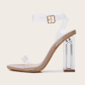 Apricot coloured women's high heel sandals with a round toe and a glass heel, featuring a buckle fastening.
