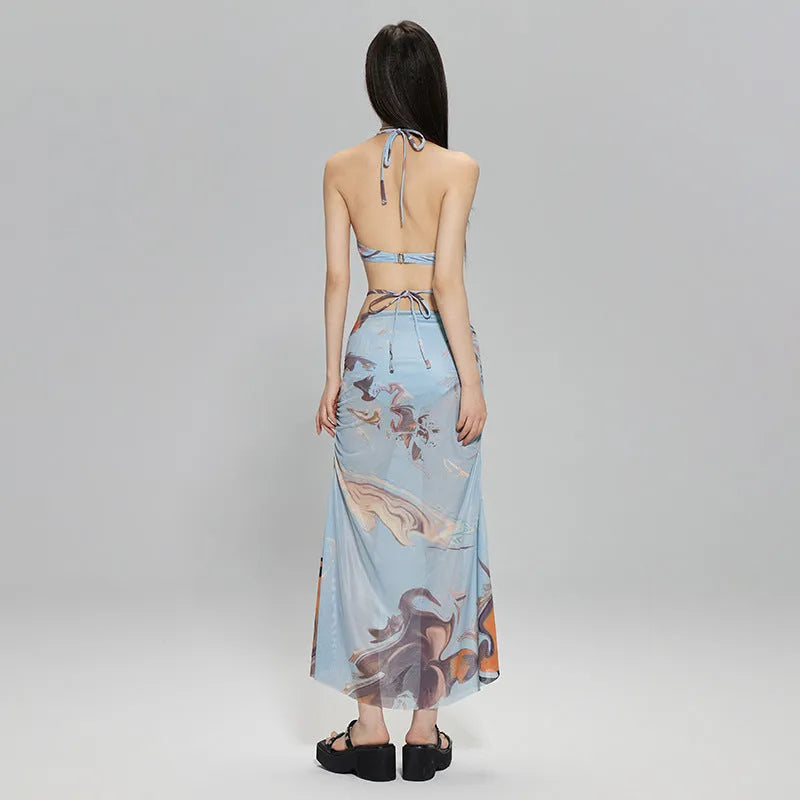 Blue women's bikini three-piece set with diamond chain detail and split design