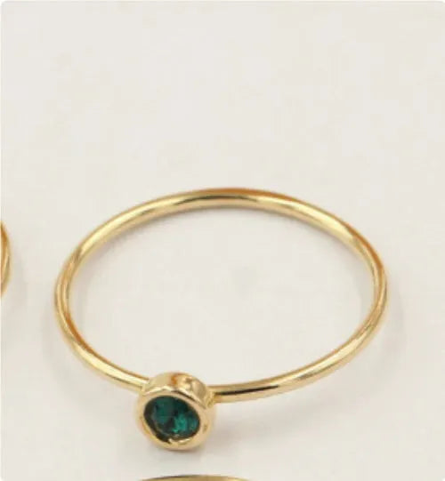 Women's knuckle ring with gilded GF setting and zircon stones on adjustable copper band
