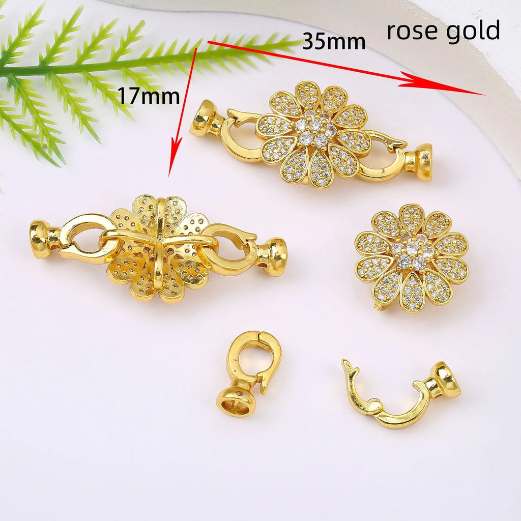 Small gold-coloured jewellery clasp with pearl detail for DIY necklace making