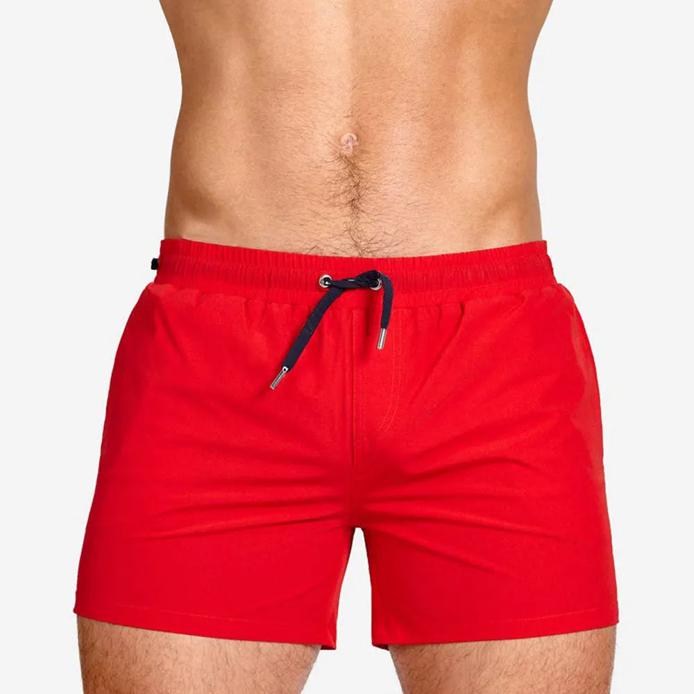 Polyester sports shorts with mesh lining in Army Green colour on size chart