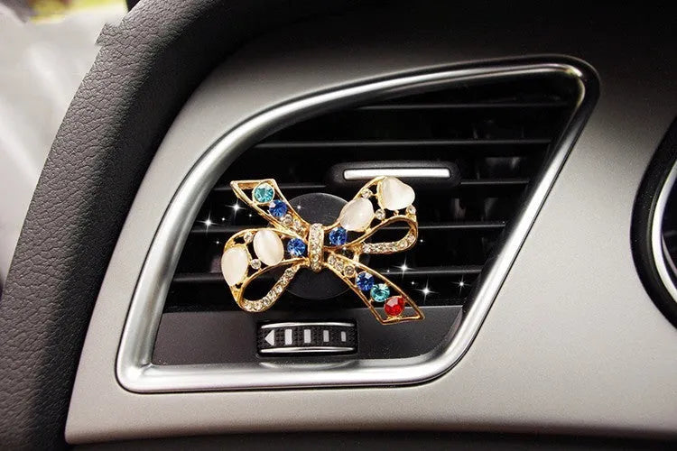 Cartoon car air vent fragrance clip with alloy material and decorative designs
