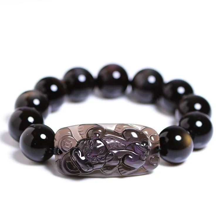 Geometric Pi Xiu charm on a polished icy obsidian crystal bracelet for men and women.
