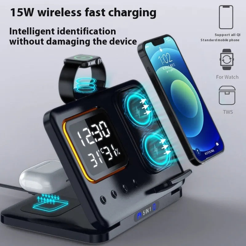 Black foldable wireless charging station displaying time and temperature, charging a phone and smartwatch.