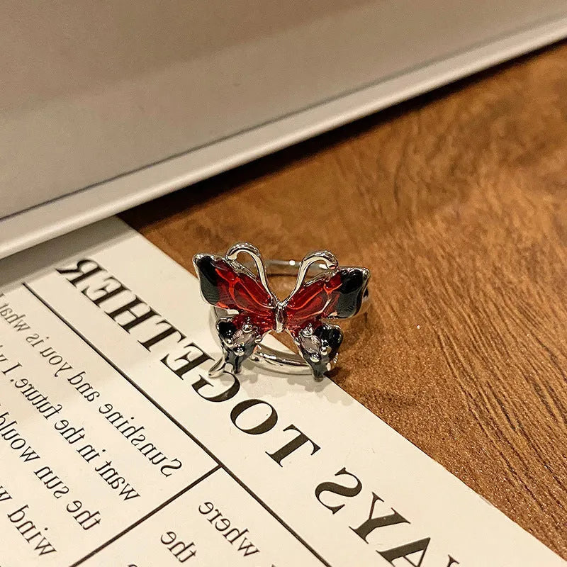 Butterfly women's copper ring with adjustable split ring design showing oil-drip colour treatment