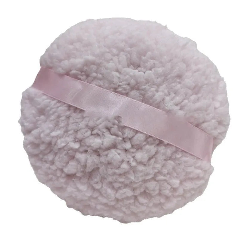 Oversized rectangular plush powder puff measuring 150x75mm in white colour