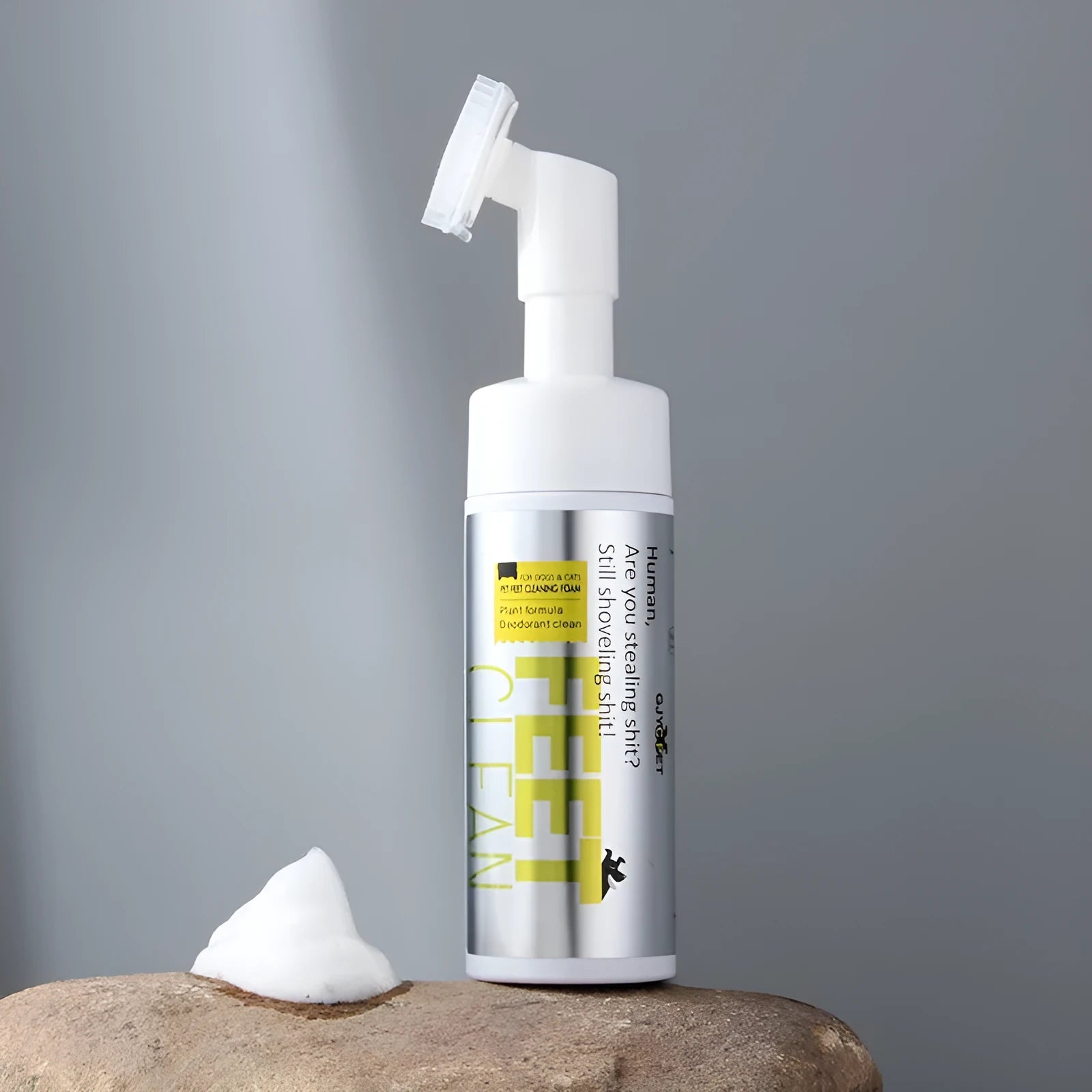 Pet grooming kit with bottles of foot cleaning foam, deodorant spray, ear cleaner, and packs of pet ear and eye wipes.