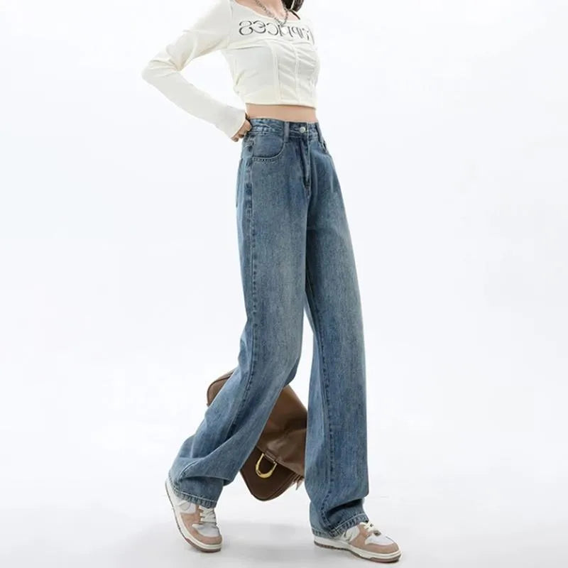 Women's high waist wide leg jeans in retro blue denim with straight leg silhouette