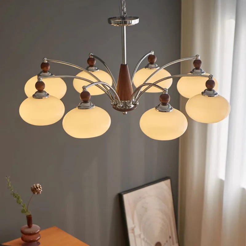 Persimmon glass ceiling chandelier with chrome frame and multiple glass lampshades in a Middle Ancient style.