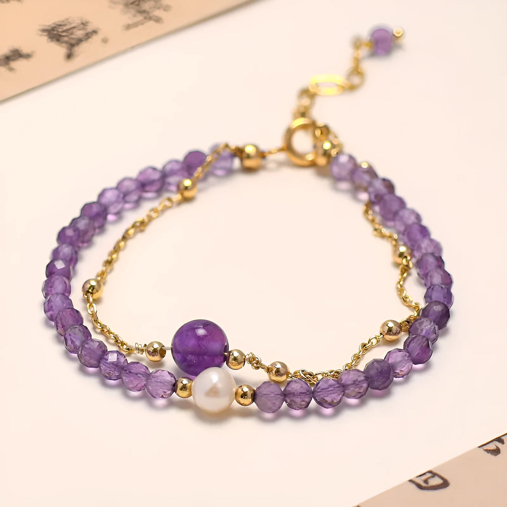 Chinese style women's crystal bracelet with amethyst coloured simulated diamond stones