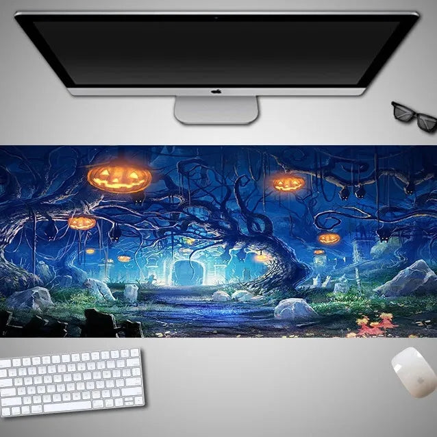 Oversized Halloween-themed rubber cloth mouse pad with non-slip base on a desk.