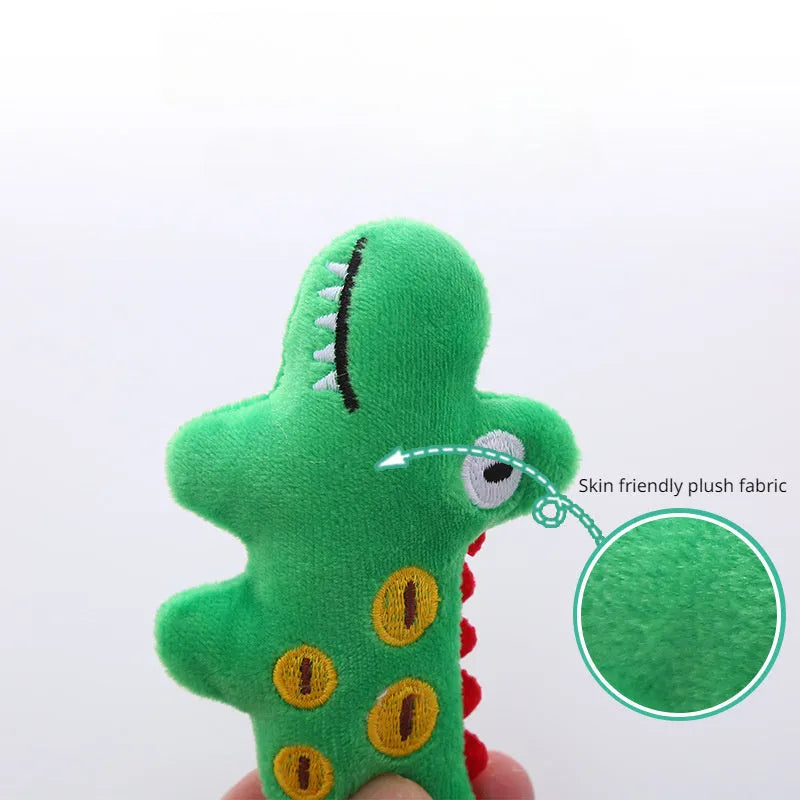 Cow shaped plush cat toy on a string handle with dangling feather, catnip inside.