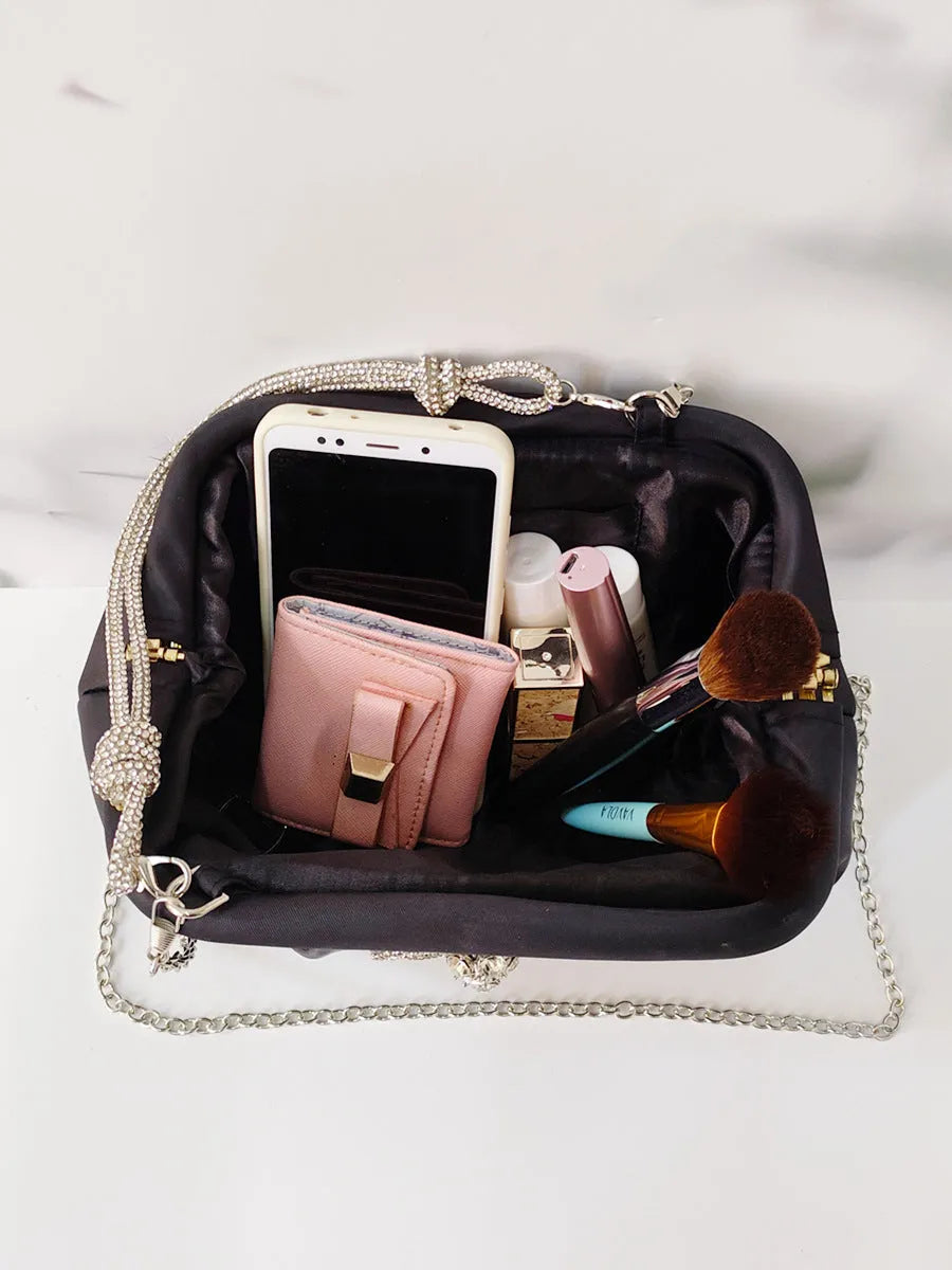 Women's soft polyester dinner bag messenger with shell shape, document organiser and diamond detailing in black, rose red or lavender purple