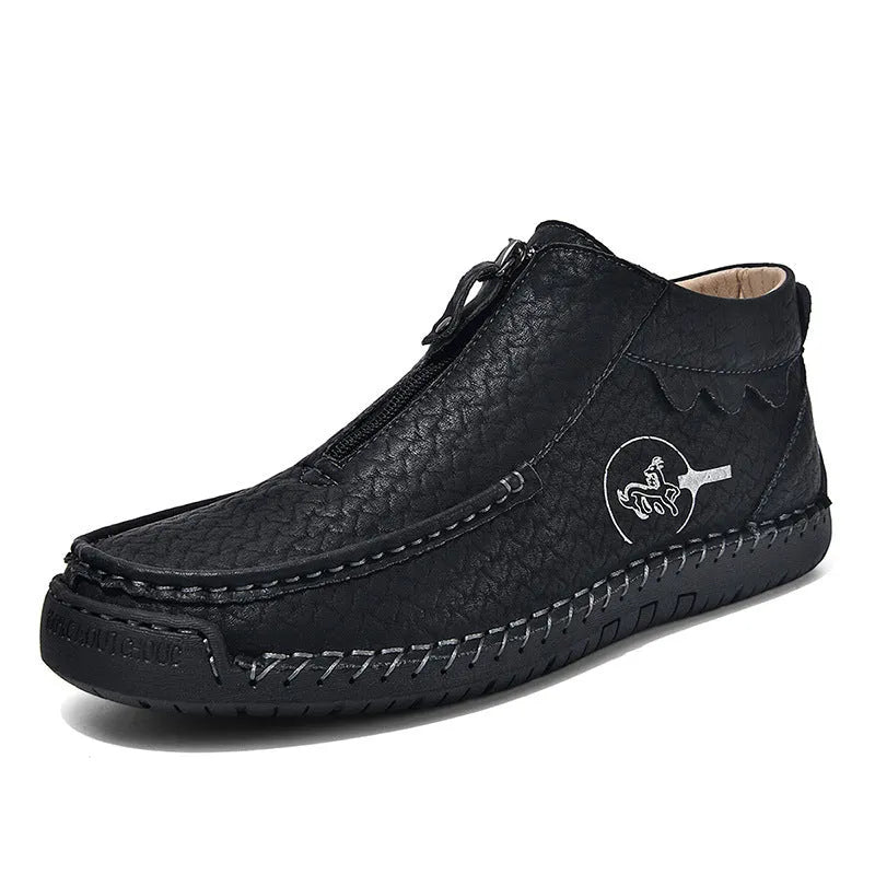 Men's black slip-on casual loafers with round toe and rubber sole.