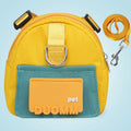 Blue dog backpack with harness and storage compartment for snacks during outdoor activities