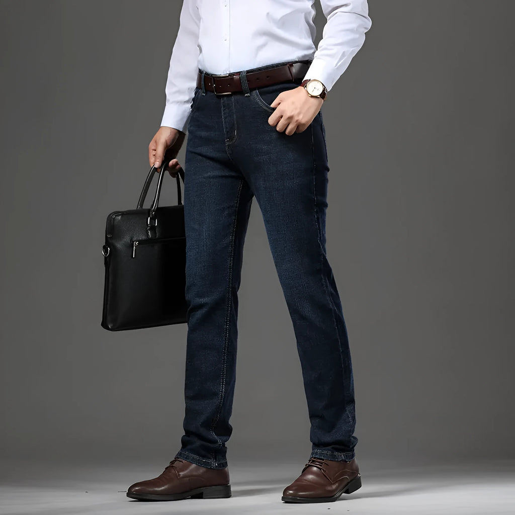 Black and blue loose fit stretch jeans straight-leg trousers on a hanger