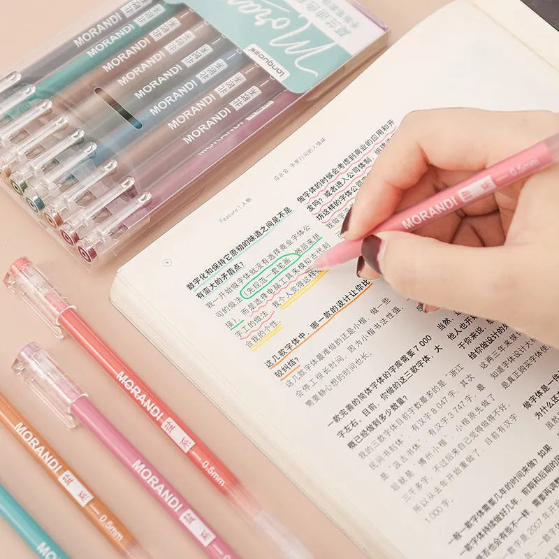 Set of nine retro-style solid-colour gel pens with 0.5mm needle tips for student notes.